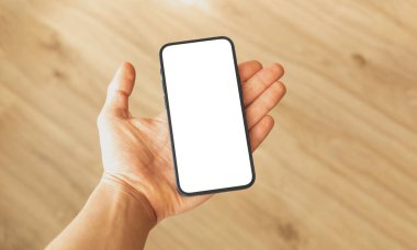 İnsan eli boş, çerçevesiz telefon, uzay fotoğrafını kopyala