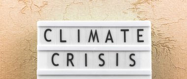 Climate crisis text banner, earth climate changes concept background photo
