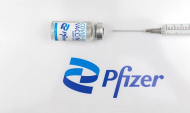 Kharkov, Ukraine - April 18, 2021: Pfizer vaccine vial, coronavirus COVID-19 vaccination concept background photo
