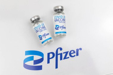 Kharkov, Ukraine - April 18, 2021: COVID-19 vaccine by Pfizer, Biontech, vaccination against Coronavirus concept photo