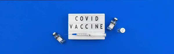 Covid Εμβόλιο Banner Έννοια Κείμενο Γράμματα Στο Lightbox Νοσοκομείο Μπλε — Φωτογραφία Αρχείου