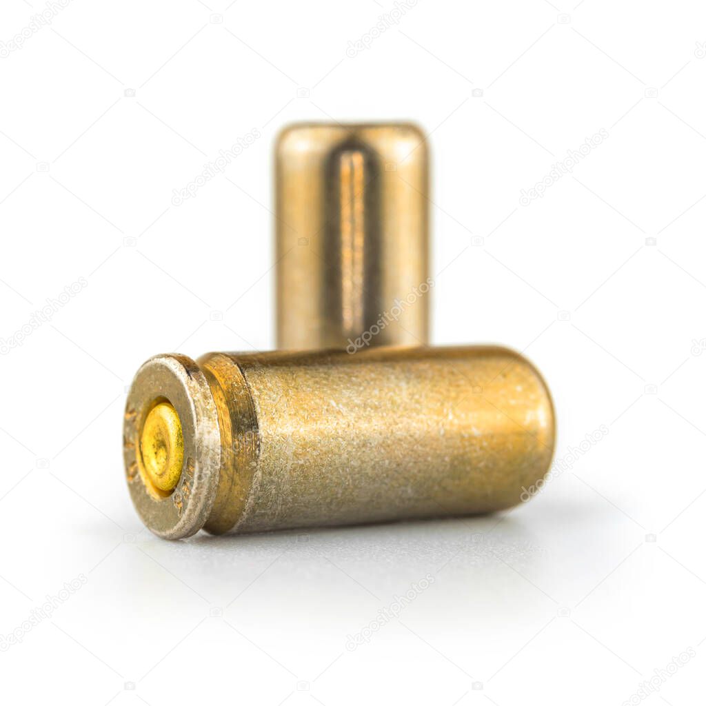 9mm pistol bullet on white background, close up and high detailed photo