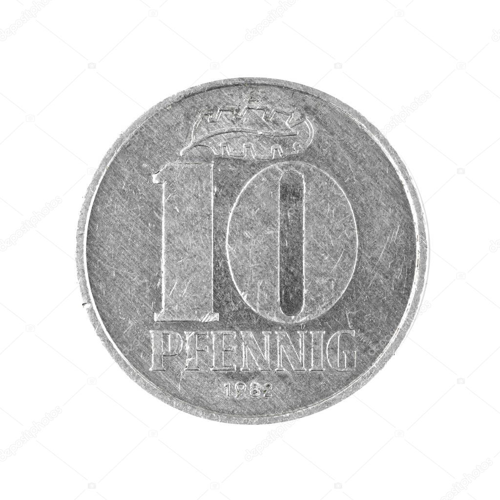 Ten 10 penning coin East German money isolated on a white background photo