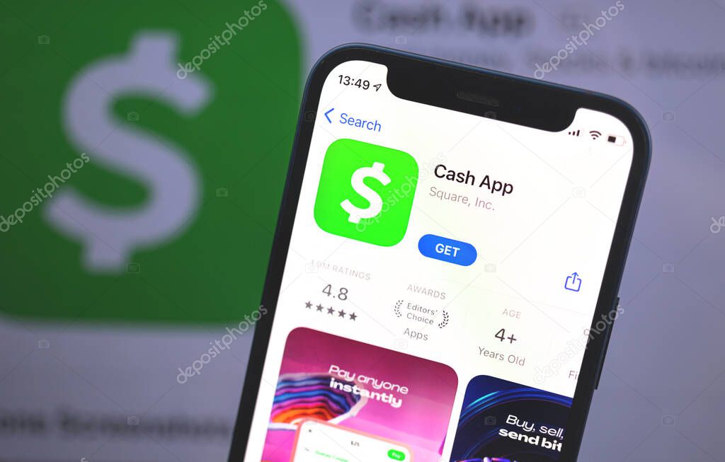 Kharkov, Ukraine - May 28, 2021: Cash app on the screen on the background of logo symbol dollar