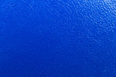 Mavi deri dokusu parlak tekstil deseni ve arka plan, yüksek çözünürlük ve yüzeyin detaylı görüntüsü.