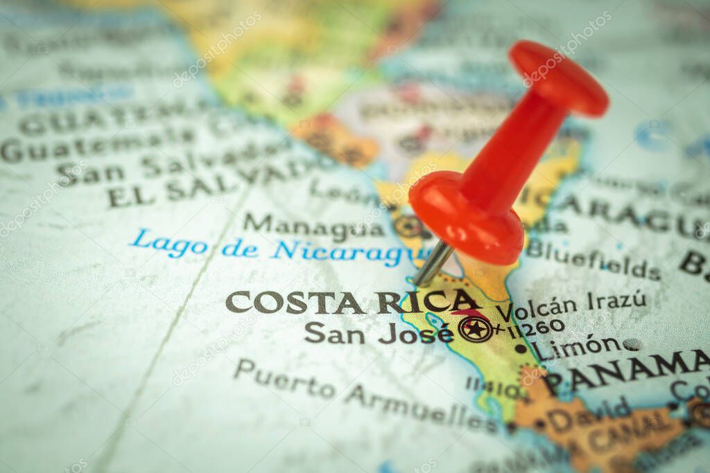 Location Costa Rica, red push pin on the travel map, marker and point closeup, tourism and trip concept, North America 