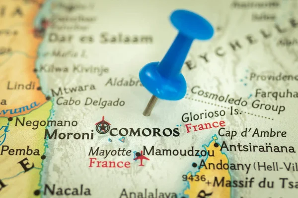 Location Comoros islands, map with push pin closeup, travel and journey concept with marker, Africa