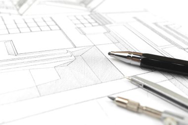 Working in office with blueprints, workplace with architectural plan and paper blueprints. Construction project concept 