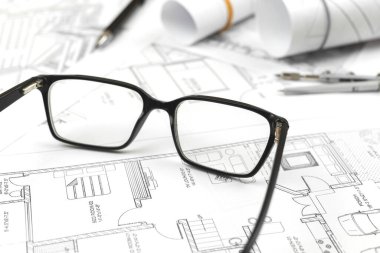 Business construction concept. Working in office with blueprints, workplace with architectural plan and paper blueprints. Construction project background 