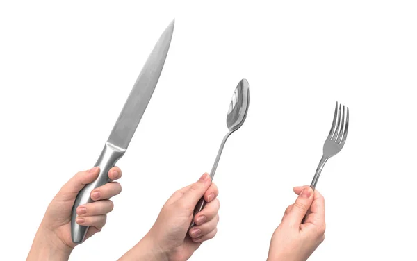 一套厨房餐具 妇女手握钢刀 叉子和勺子 与白色背景隔离 — 图库照片