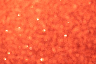 Soyut kırmızı bulanık bokeh arkaplan. Parlak ışıklar. Bayram, Noel ve yeni yıl tasarımı için şenlik ve kutlama arkaplanı