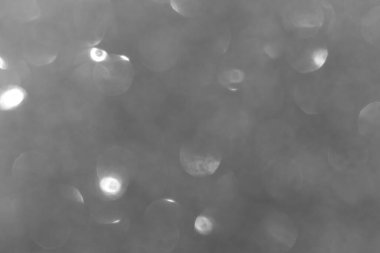 Bulanık siyah parıltı dokusu arka planı. Bulanık siyah parlak bokeh efektleri 