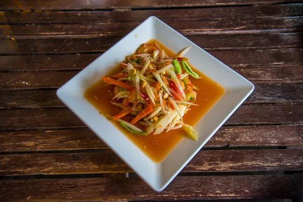 Papaya salad on the table in the restaurant. — Stock Photo, Image