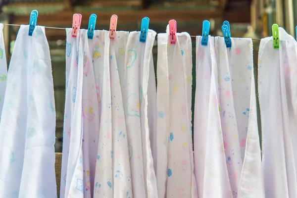 Diaper hanging on a clothes line. — Stock Photo, Image