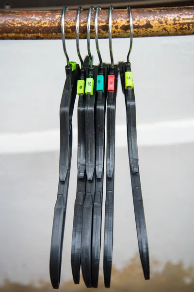 Hangers hung on the clothes line. — Stock Photo, Image