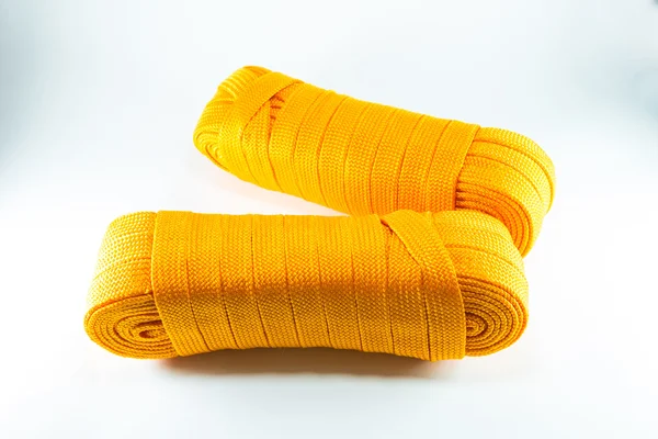 Rollos de cuerda naranja planos —  Fotos de Stock