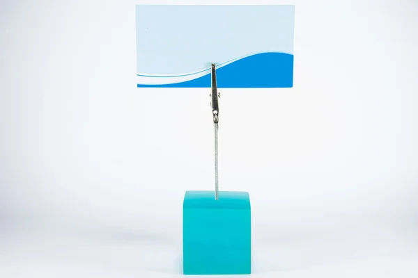 Blank blue paper clamp by blue cube alligator wire — Stock Photo, Image