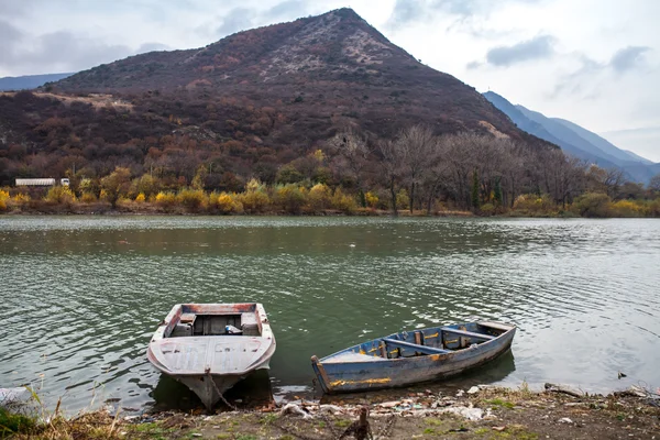 Two old boats on the sea