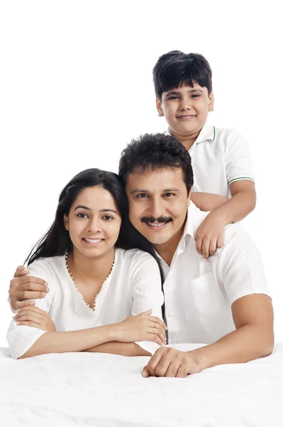 Portrait of a smiling boy with his parents — Stock Photo, Image