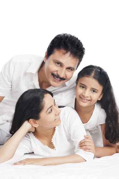 Portrait of a girl smiling with her parents — Stock Photo, Image