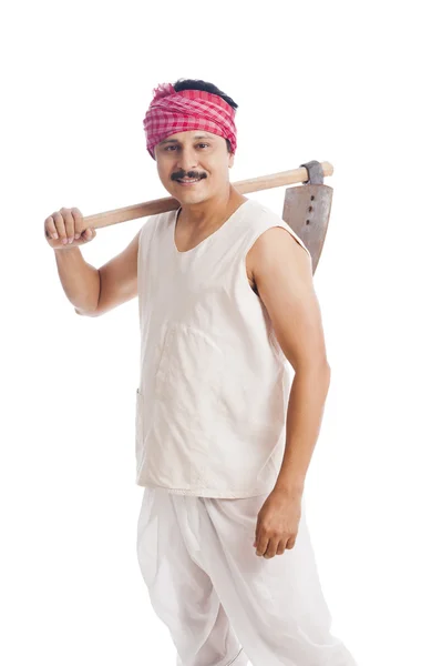 Portrait of a farmer carrying spade on his shoulders — Stock Photo, Image