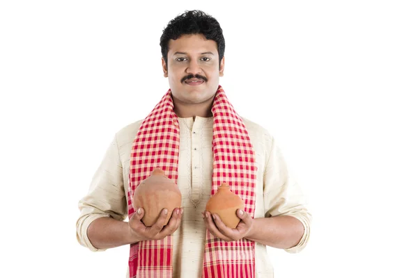 Portrait of a man carrying piggy banks in both hands — Stock Photo, Image