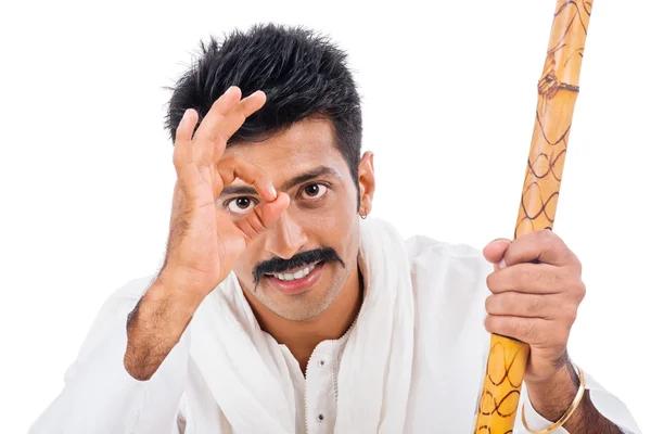 Portrait of a man holding wooden staff and gesturing — Stock Photo, Image