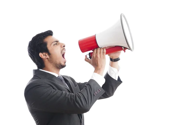 Empresario gritando en un megáfono — Foto de Stock
