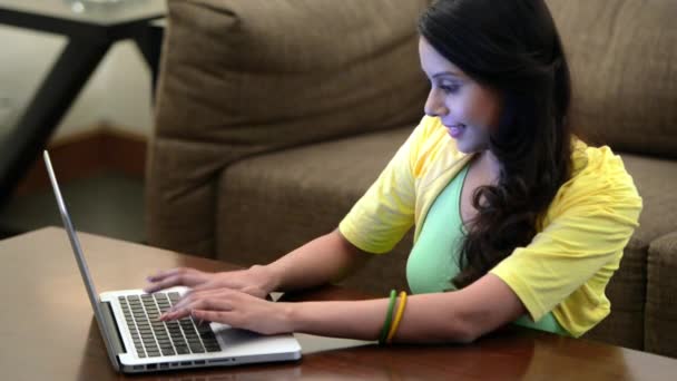 Woman using a laptop — Stock Video