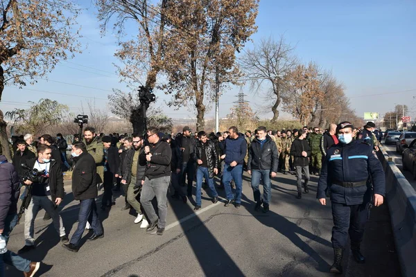 Ermenistan başbakanı Nikol Paşinyan önderliğindeki Yas Yürüyüşü, 19 Aralık 2020 'de vatanları Artsakh Cumhuriyeti' ni Azero-Türkçe terörizmden korumaya çalışırken ölenleri anmak için düzenlendi.