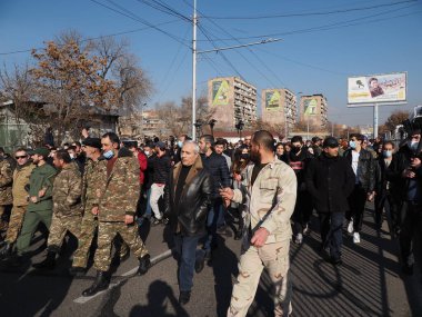 Ermenistan başbakanı Nikol Paşinyan önderliğindeki Yas Yürüyüşü, 19 Aralık 2020 'de vatanları Artsakh Cumhuriyeti' ni Azero-Türkçe terörizmden korumaya çalışırken ölenleri anmak için düzenlendi.