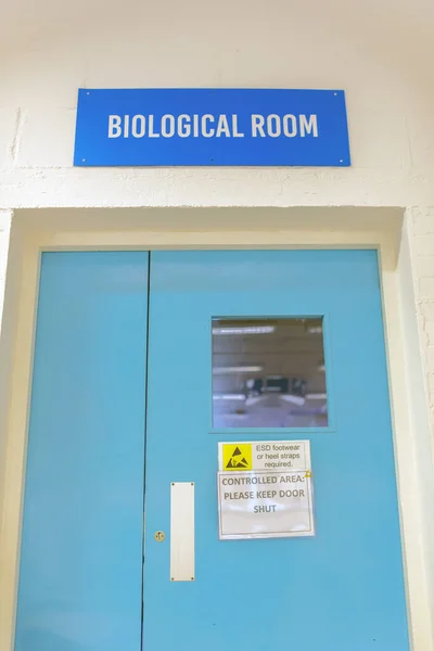 The door to a biological room in a medical manufacturers. Medical products, clean room, bio room, controlled area concept