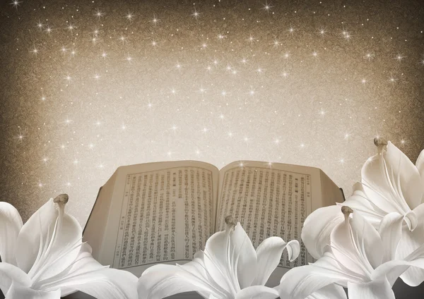 Біблія та квіти лілії — стокове фото