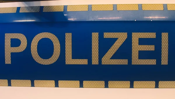 Tysk Polis Polizei Skylt Med Vita Bokstäver Polisbil Stockbild