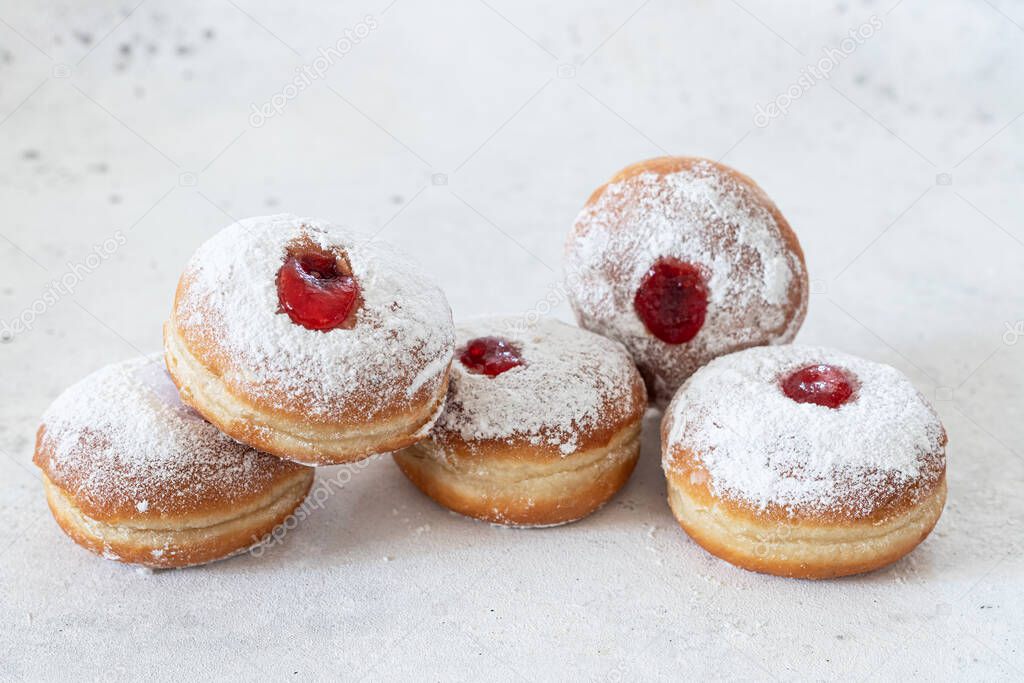 Fresh donuts with jam for Hanukkah celebration