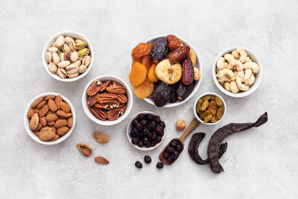 Mix from dried fruits and nuts in a bowl. Healthy food. Symbols of judaic holiday Tu Bishvat