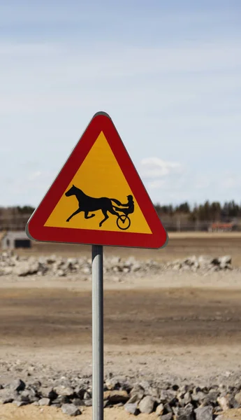 road sign warning for horse with carriage