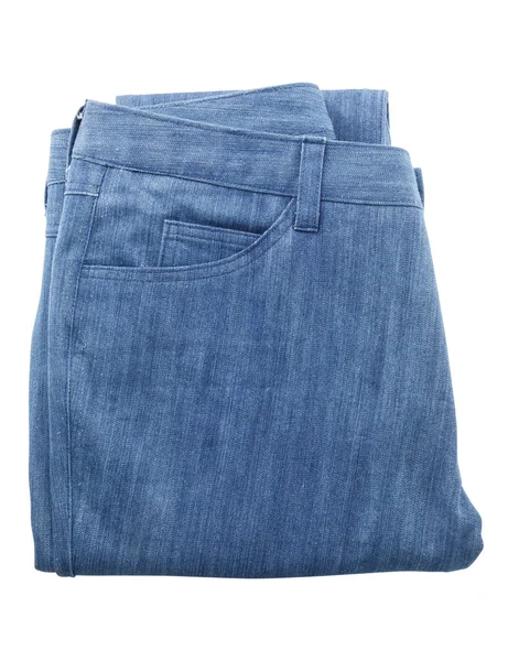 Folded blue jeans isolated on white background — Stock Photo, Image
