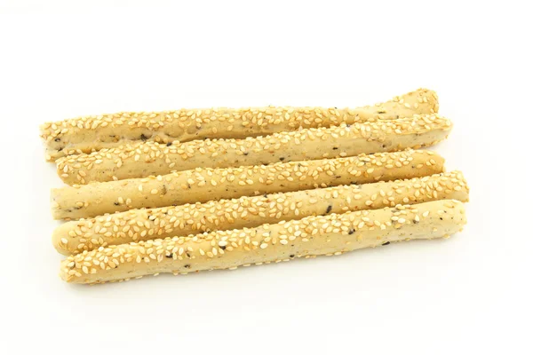 Crispy sticks with sesame on white background — Stock Photo, Image