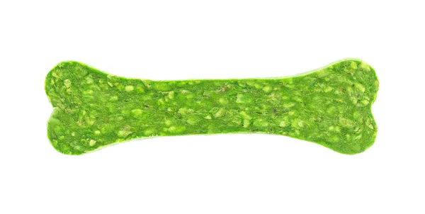 Beyaz arka plan üzerinde izole yeşil köpek kemiği — Stok fotoğraf