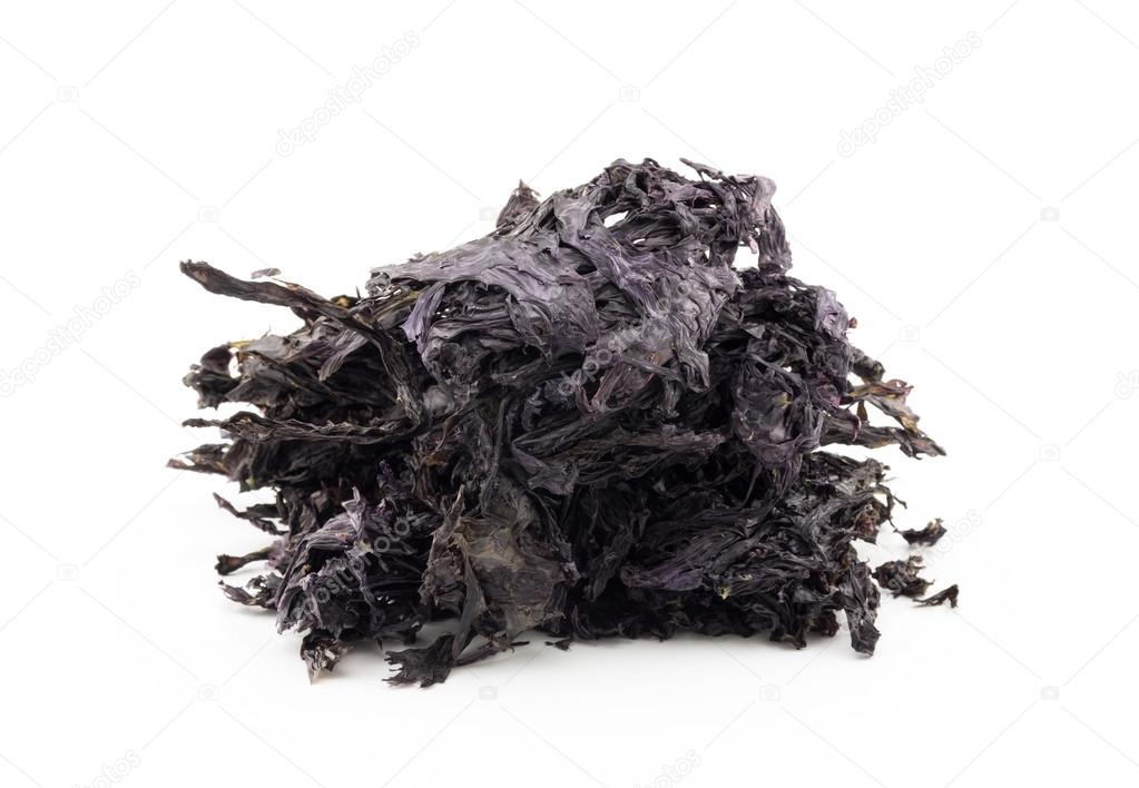 Dried black seaweed isolated on white background
