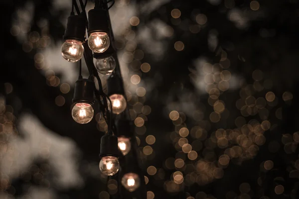 Small light bulb with bokeh background — Stock Photo, Image