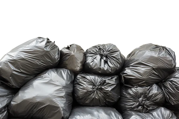 Hromadu odpadkové pytle izolovaných na bílém pozadí — Stock fotografie