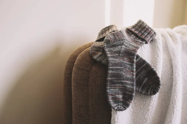 Pair Hand Knitted Socks Sofa Sunlight Natural Colors — Stock Photo, Image
