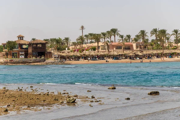 Hurghada, Egypt - September 29 2020: People relaxing on the beach in Hurghada, Egypt.