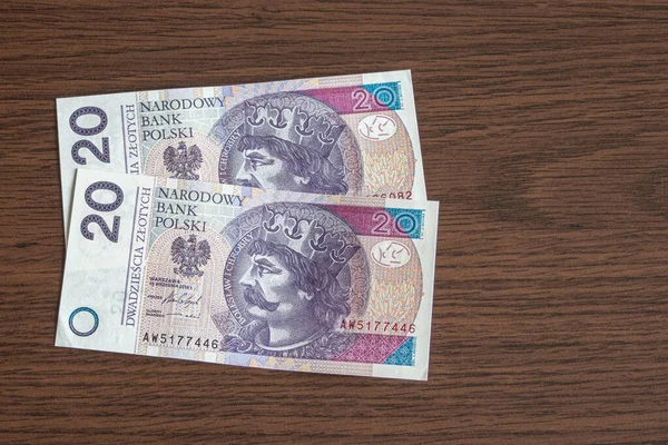 20张波兰兹罗提纸币放在一张木制桌子上 — 图库照片