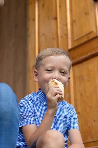 Contented Cheerful Child Boy Blue Shirt Eats Ice Cream Porch — Stock Photo, Image