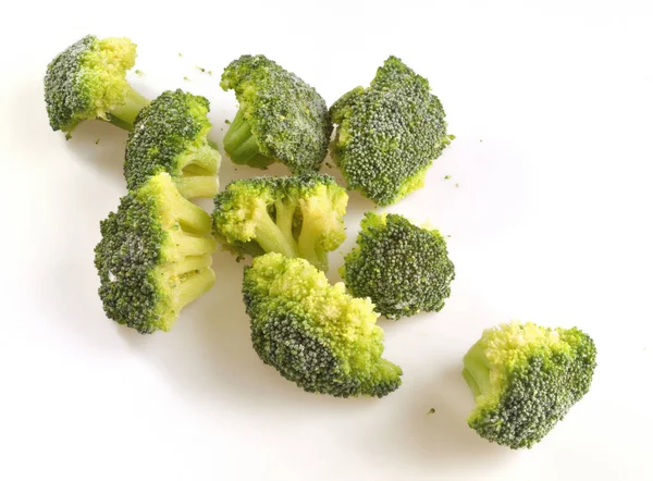 Frozen Broccoli Its Crumbs Isolated White Background — 스톡 사진