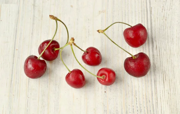 Several Sprigs Cherries Wooden Surface Light Colo — Stock Photo, Image