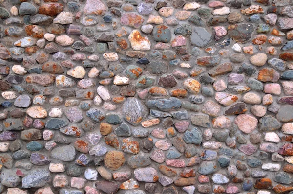 Wand aus Kieselsteinen und Zement Hintergrund — Stockfoto